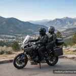 Guest Passenger Liability: What Riding Two-Up Means for Insurance Two riders in full gear on a touring motorcycle at a scenic overlook, helmets on, calm daylight