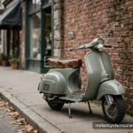 Scooters, Mopeds & E-Bikes: Which Insurance Rules Apply A vintage-style scooter parked by a brick wall in a downtown street, no people